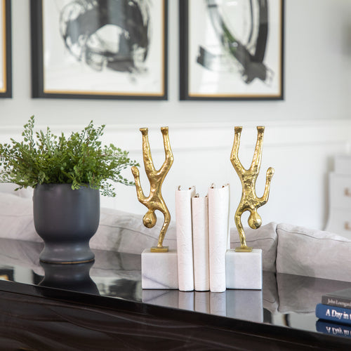 BALANCING HUMAN BOOKENDS